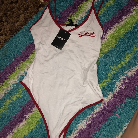 Forever 21 Tops - A cute body suit ! NEVER WORN